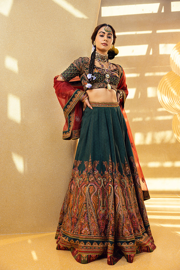 Mehjabeen Lehenga Set — Natural silk with hand-painted floral motifs, intricate thread embroidery, beads and sequins, and an organza dupatta. This is an Indian wedding lehenga built for a grand reception — the kind of piece that earns a second look across a room. Wear it with layered jadau jewellery and let the craftsmanship do exactly what it was made to do.