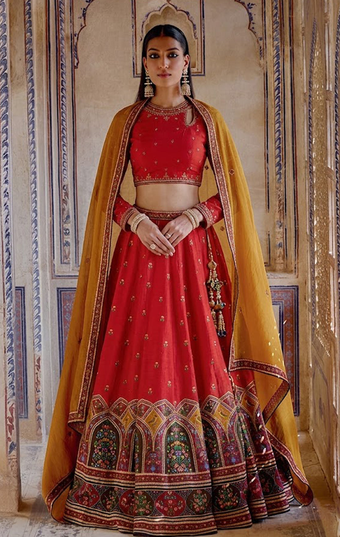 Red remains the most iconic choice for Indian brides, deeply rooted in both tradition and symbolism. A red wedding lehenga photographs magnificently, complements almost every skin tone, and carries an emotional resonance that few other colours can match. If you feel drawn to it, trust that instinct — it is classic for a reason.