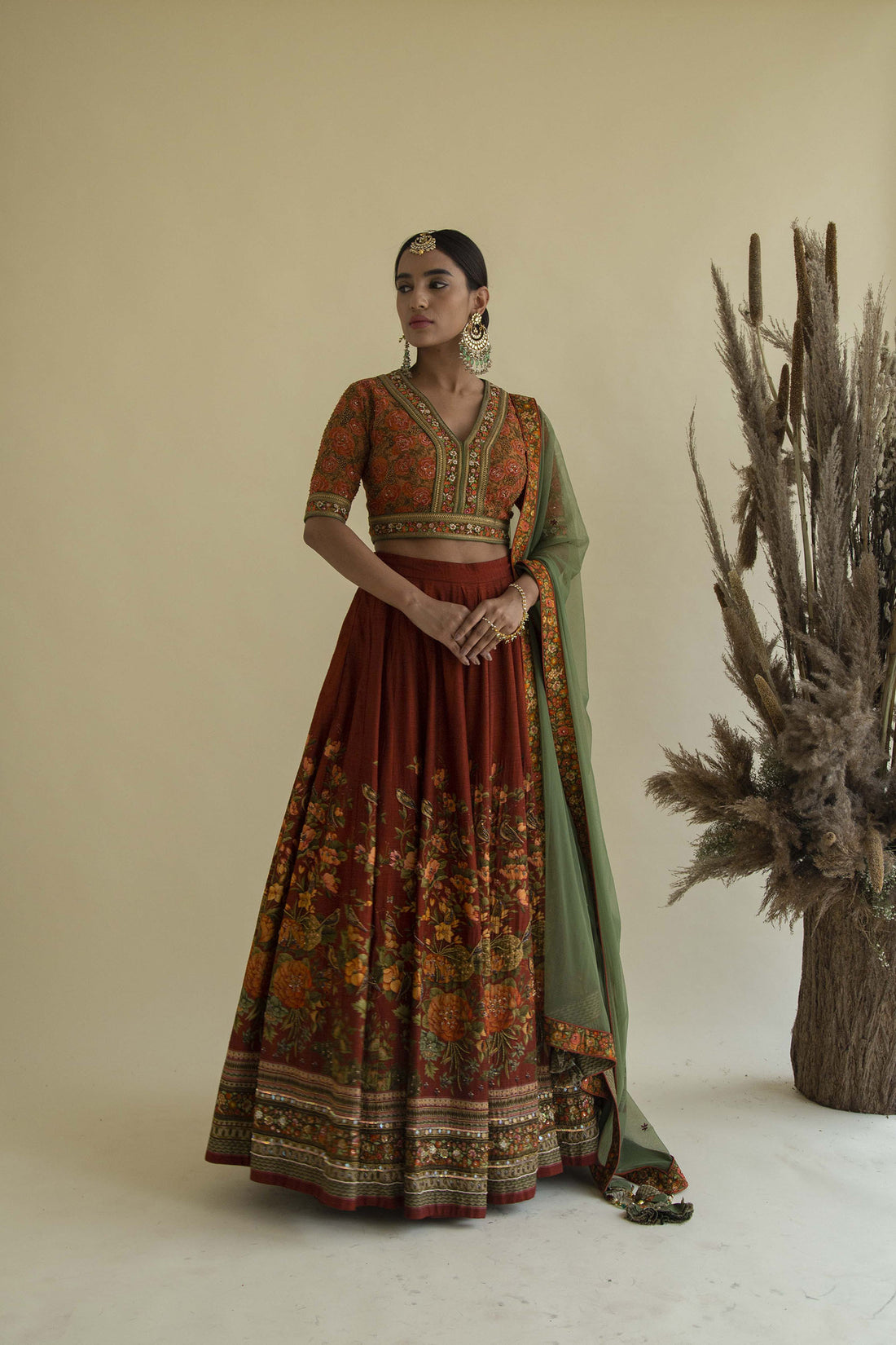 What to pair it with: Antique gold jewellery, a potli bag, hair open. Keep everything else quiet and let the painting do its thing.